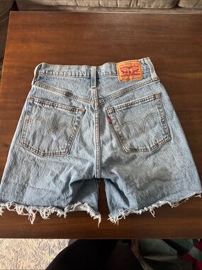 Levi's 501 mid thigh Blue Denim Cutoff Shorts 25